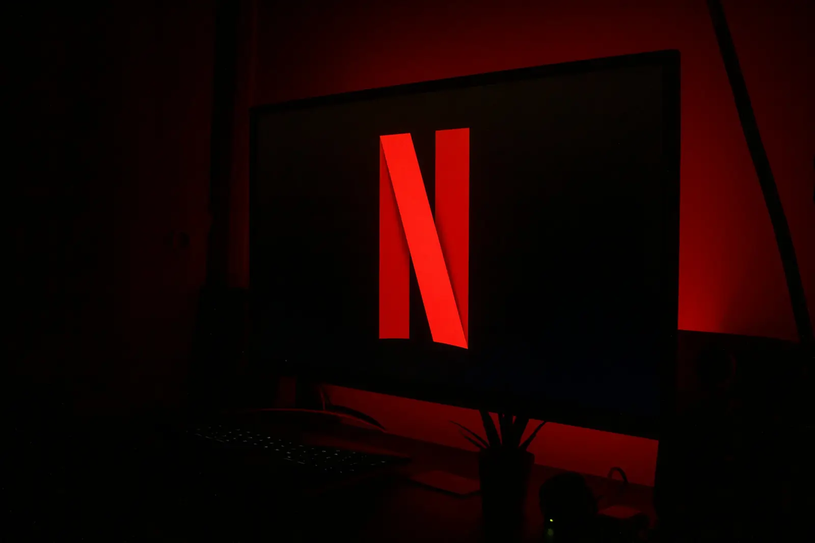 TV and keyboard on a desk, ready to enter an IPTV login