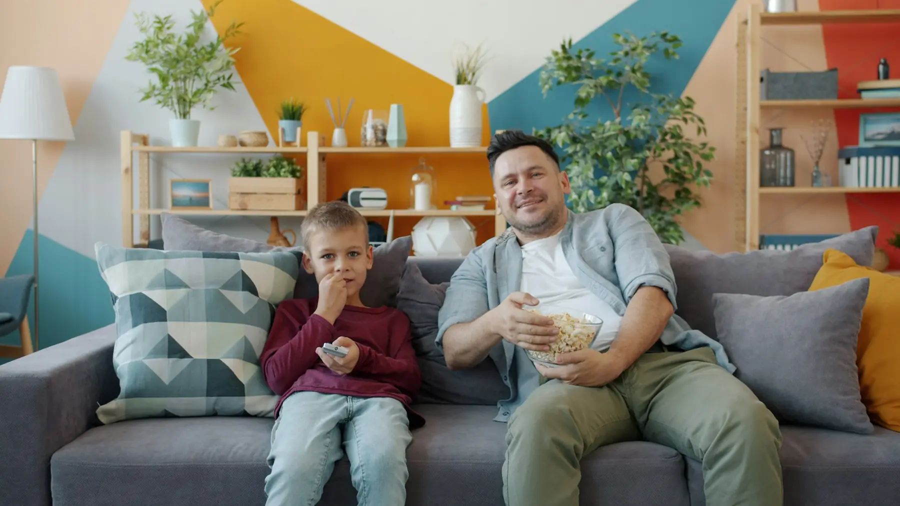 Family watching TV together